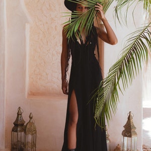 Indulge in an ethereal ensemble with this low back slit, empire waist goddess dress- perfect for any romantic occasion.