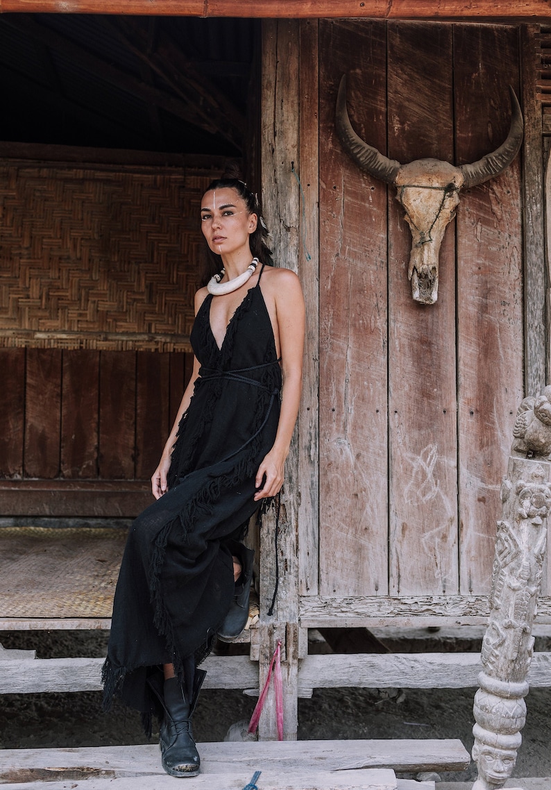 Get the ultimate beach wedding dress for your special day: a black, organic minimalist dress that's both beautiful and unique.