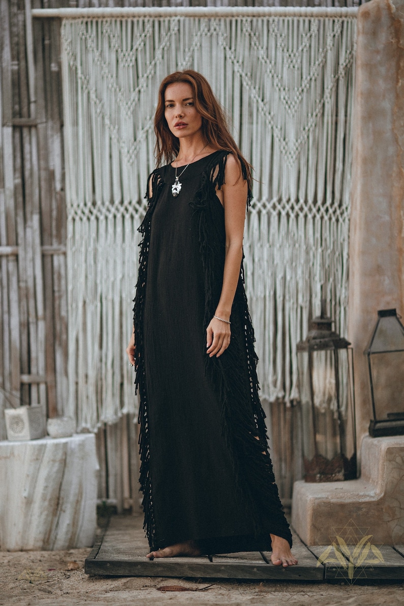 Get Bohemian Glam - Indulge in a little luxury with this beautiful handwoven bohemian slip dress. Presented in 4 sizes, this luxurious black dress is a must-have for your wardrobe.