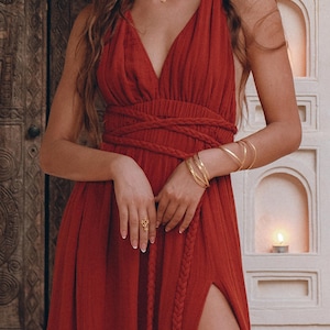 Step into your goddess realm this season with this stunning and unique dress! Crafted from organic and breathable handwoven cotton, it'll make you stand out.