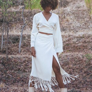 Find your perfectly fitted Skirt size between XS, S, M, & L with the Off-White Goddess Tassels Skirt.