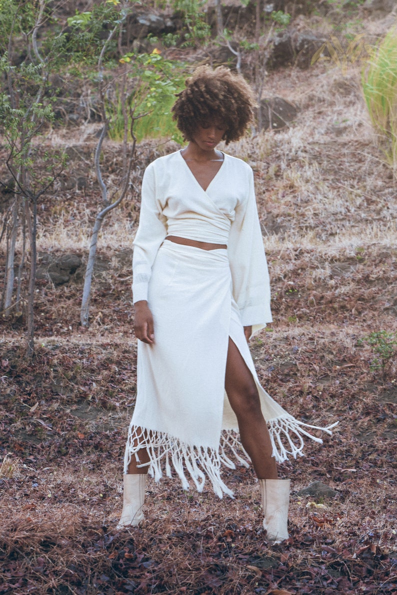 Find your perfectly fitted Skirt size between XS, S, M, & L with the Off-White Goddess Tassels Skirt.