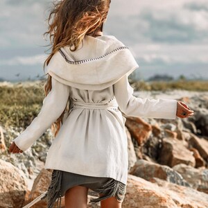 Protect Against the Elements - Keep the cold weather at bay with this stylish and snug Boho overcoat, kimono robe, hoody cardigan, belted wrap cardigan, white long coat or high long jacket with belt hood.