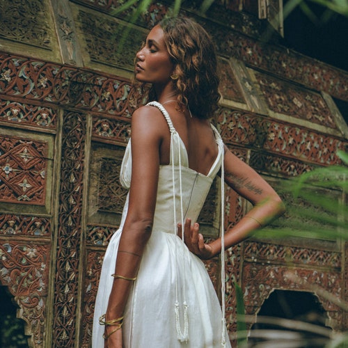 white dress with brown corset