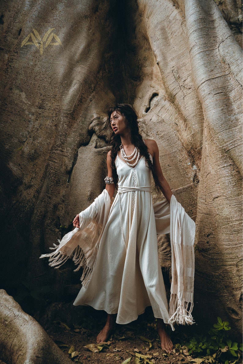 Look beautiful in this special Bridal Goddess Dress! This off white dress features hand embroidered details and is perfect for your ceremonial celebration.