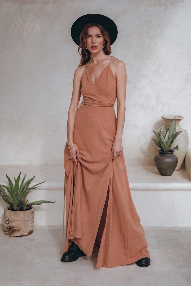 Timeless and elegant: our open backSummer Dresses are handmade with sustainably dyed raw cotton - perfect to wear as a wedding guest dress or bohemian maxi dress!