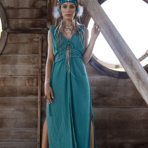 Discover true freedom with AYA's maxi Green Turquoise Multiway Dress. Be extraordinary and feel special in this hand-made, adjustable dress made from organic cotton. Perfect for prom or a day out at the beach.