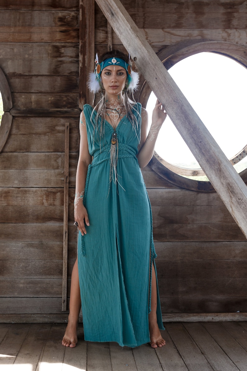 Discover true freedom with AYA's maxi Green Turquoise Multiway Dress. Be extraordinary and feel special in this hand-made, adjustable dress made from organic cotton. Perfect for prom or a day out at the beach.