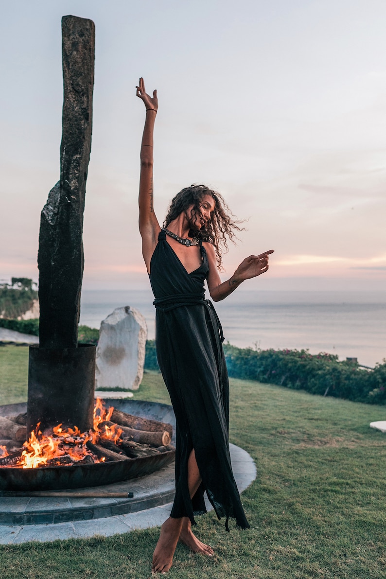 Get ready for your next big event wearing this stunning black organic bohemian dress with back laces.