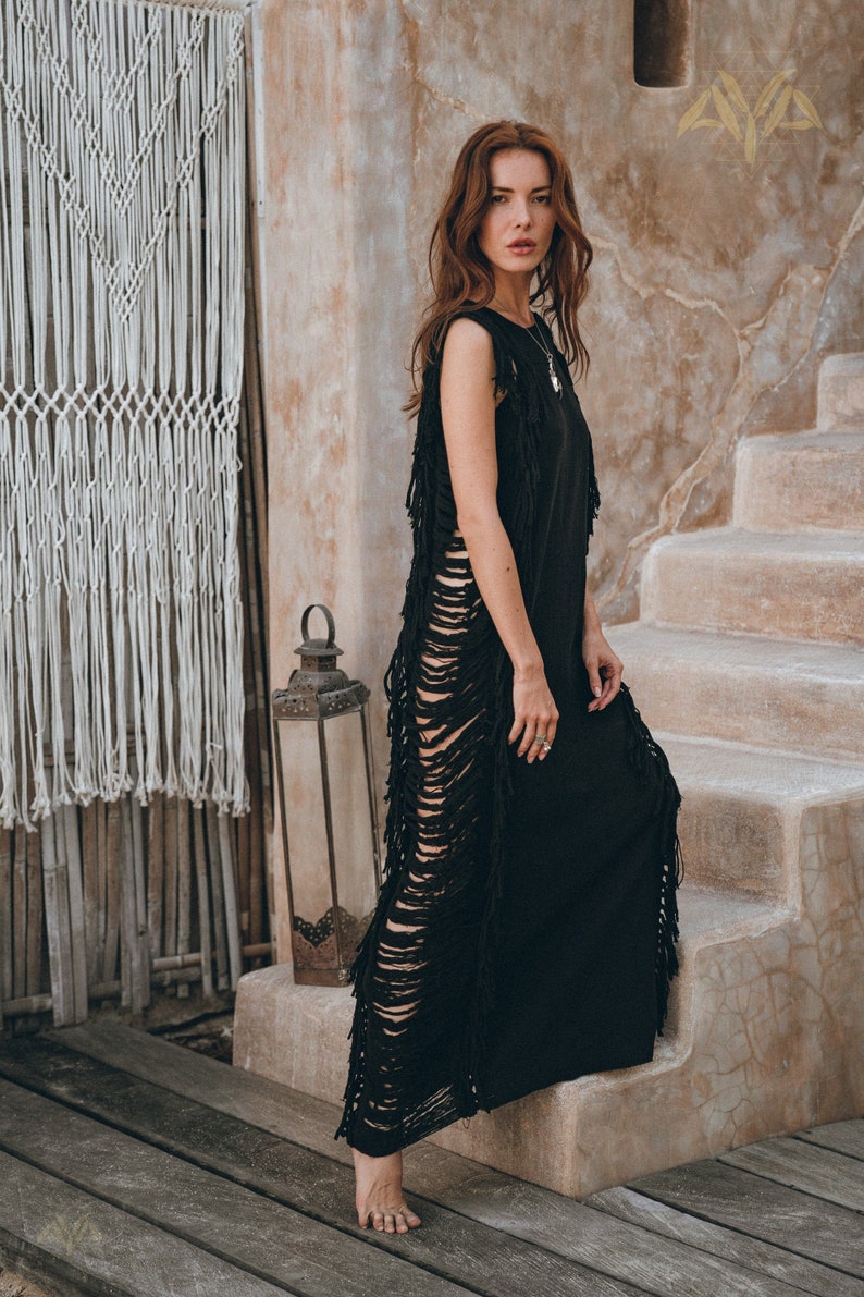 Fabulous Fabric Find - Check out this awesome black see-through dress! This eco-friendly fashion piece is handmade from organically dyed cotton and comes in 4 sizes.