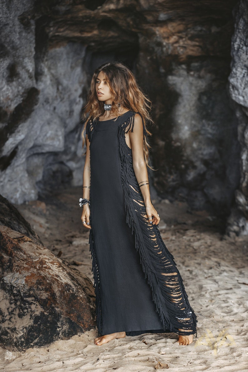 Fringe Plus Flair – Get summer-ready with this amazing frayed beach cover up dress! Featuring handwoven organically dyed cotton, this beautiful black dress gives an extra touch of boho flair to your beach look.