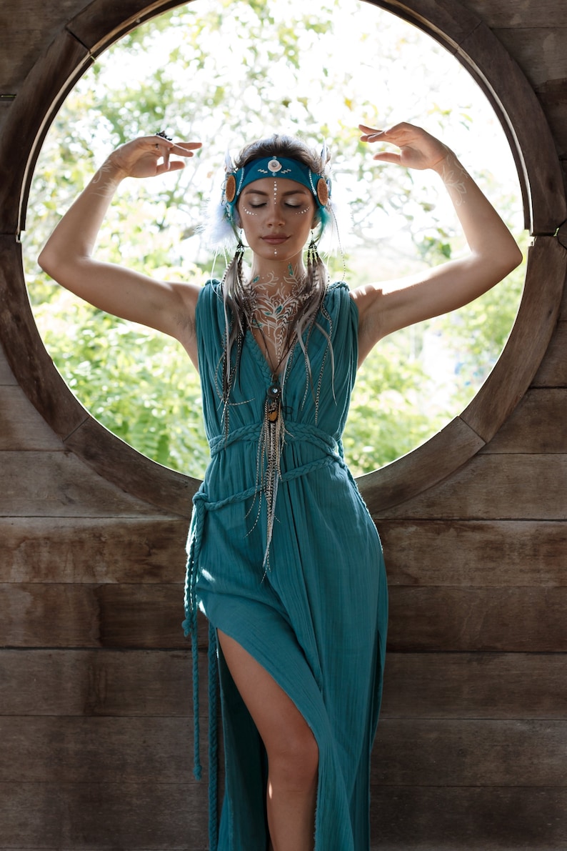 Be the bohemian goddess you are in AYA's original Green Turquoise Dress. It's sustainable, green, adjustable and fits all sizes, so you can free yourself and feel like a queen with its intricate braiding.