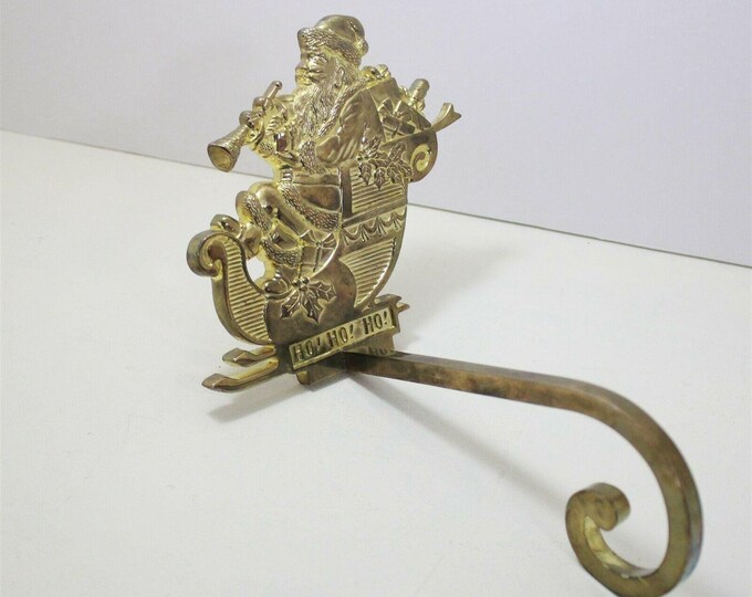 Vintage Stocking Holder Brass Long Arm Santa Claus in Sleigh Hanger