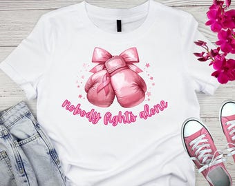 Camiseta de concientización sobre el cáncer de mama, camiseta "Nadie lucha solo contra el cáncer", regalos de apoyo contra el cáncer