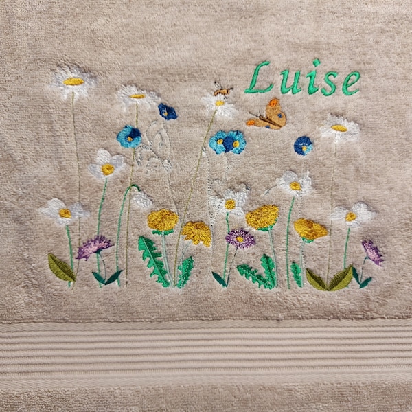 Towel embroidered with a flower meadow