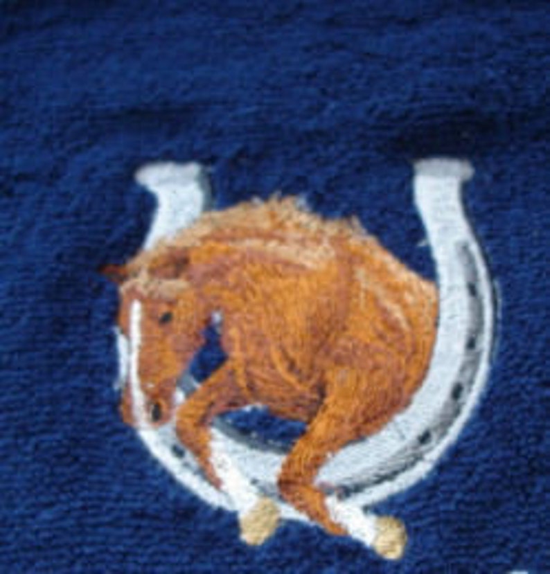 Towel embroidered with horse motif and name image 1