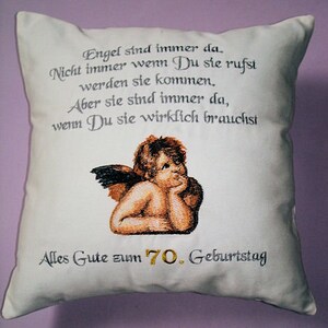 Pillow embroidered with angel and saying