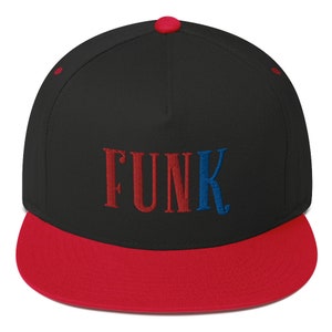 May include: Black and red flat brimmed baseball cap with the word "FUNK" embroidered in red and blue.