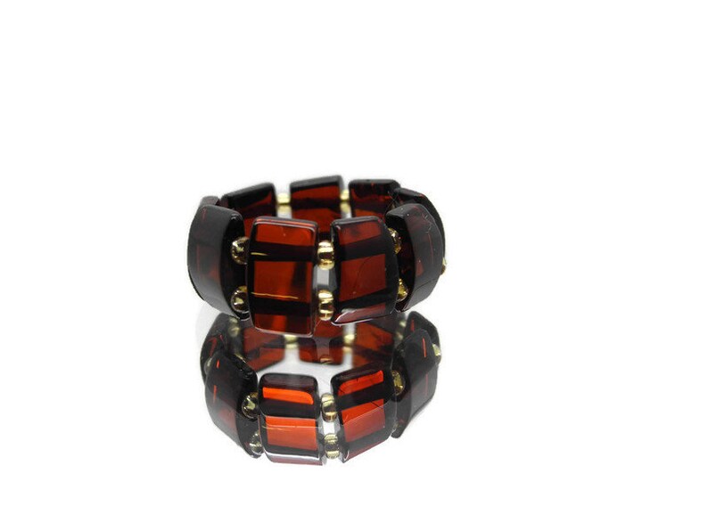 Natural Baltic amber ring on silicone