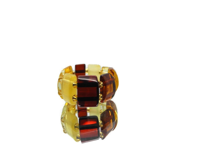 Natural Baltic amber ring on silicone