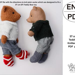 May include: Two brown teddy bears wearing knitted socks. The teddy bear on the left is wearing a white sweater and blue jeans. The teddy bear on the right is wearing a green sweater and plaid pants. The image includes the text "ENG PDF" and "37 cm EFI Teddy Bear Knitted socks PDF pattern".