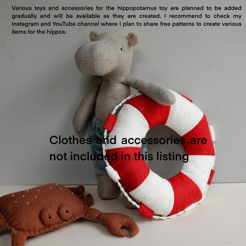 May include: A gray fabric hippopotamus toy holding a red and white life preserver. A brown fabric crab is lying on the floor next to the hippopotamus. Clothes and accessories are not included in this listing.