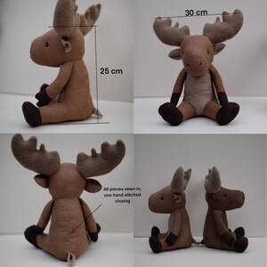 May include: A brown plush moose toy sitting with its legs crossed. The moose is 25 inches tall and 30 inches wide. All pieces are sewn in, with one hand-stitched closing.
