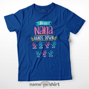 May include: Blue t-shirt with the text "Best Nana Hands Down" and handprints with names below. The names are Madison, Richard, Evan, Kaleb, Zack, Tracy, and Colton.