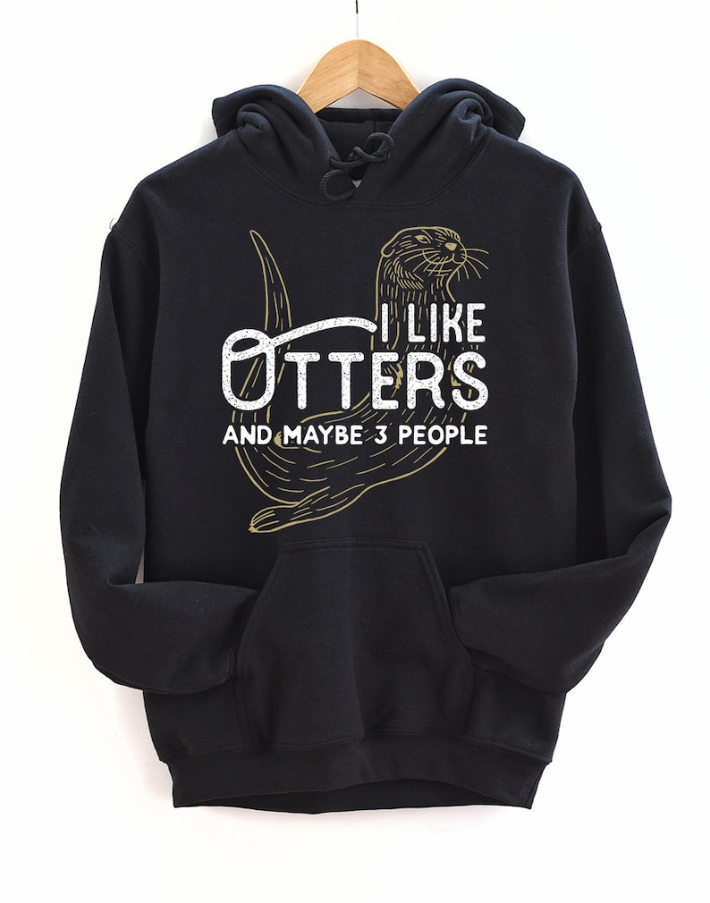 May include: Black hooded sweatshirt with a graphic of an otter and the text "I like otters and maybe 3 people".
