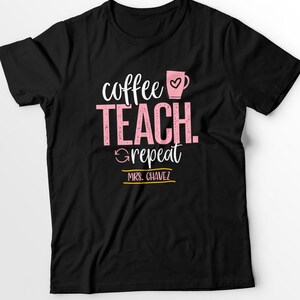 May include: Black t-shirt with pink text that reads "coffee teach repeat" and a pink coffee cup with a heart. The text "MRS. CHAVEZ" is in a gold rectangle below the text.