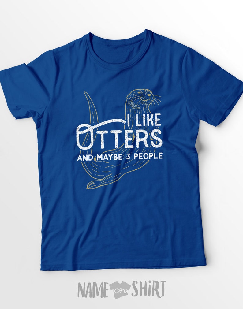 May include: A royal blue t-shirt with a graphic of an otter and the text "I like otters and maybe 3 people".