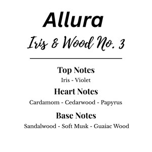 May include: A white background with the word "Allura" in a bold, black font. Below, "Iris & Wood No. 3" is written in a cursive font. The image lists fragrance notes: Iris, Violet, Cardamom, Cedarwood, Papyrus, Sandalwood, Soft Musk, and Guaiac Wood.