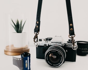 Leather camera strap. Color Black. Handmade in Italy with genuine Tuscany Leather.