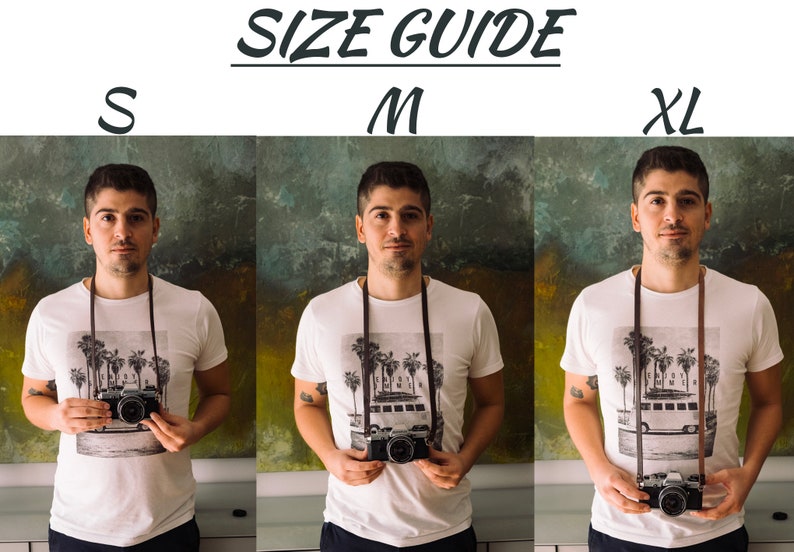 May include: Size guide for a white t-shirt with a palm tree graphic and a brown camera strap. The guide shows three sizes: S, M, and XL.