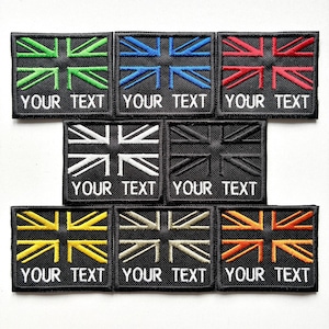 May include: A selection of square Union Jack flag patches in a variety of colours, including green, blue, red, white, black, yellow, tan, and orange. Each patch has the text "YOUR TEXT" in white.