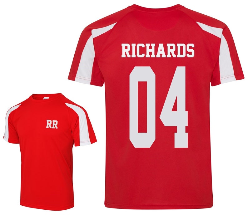 May include: Two red athletic shirts with white accents. One shirt displays "RR" in white, while the other features "RICHARDS" and the number "04" in white. Both shirts have a sporty design.