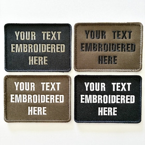 May include: Four rectangular embroidered patches in black, brown, and olive green. Each patch features the text "YOUR TEXT EMBROIDERED HERE" in a contrasting colour. The patches are arranged in a 2x2 grid.