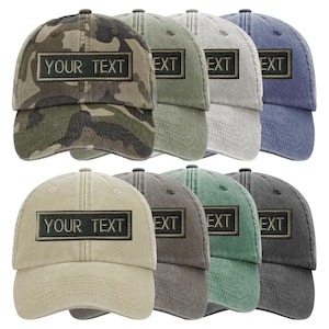 May include: A selection of baseball caps in shades like camouflage, khaki, and grey-blue. Each cap has a rectangular patch with the text "YOUR TEXT" or "EXT". The caps are displayed in two rows. The caps are a popular style.