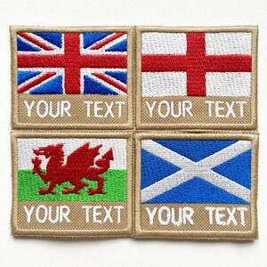 May include: Four embroidered patches displaying the flags of the UK, England, Wales, and Scotland. Each patch has a beige border and the text "YOUR TEXT" in white. The flags are in red, white, blue, and green.