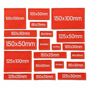 May include: A collection of red rectangular patches with white text indicating dimensions in millimeters. Sizes range from 40x25mm to 150x100mm. The patches are arranged on a white surface.