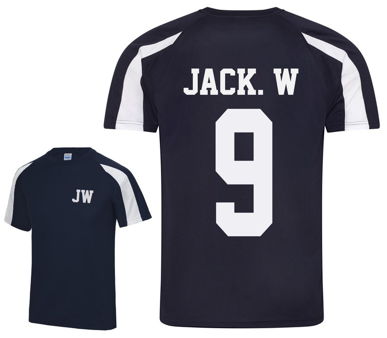 May include: Navy blue athletic t-shirt with white accents on the sleeves and shoulders. The back of the shirt displays the name "JACK. W" above the number "9" in white. The front of the shirt has the initials "JW" in white.