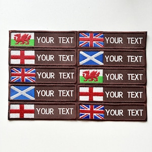 May include: Embroidered patches with flags of the UK, England, Scotland, and Wales. Each patch has a brown background and the text "YOUR TEXT". The patches are rectangular and suitable for clothing.