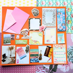 25 Piece Stationery Grab Bag, includes memo sheets, stickers, washi tape samples, ephemera