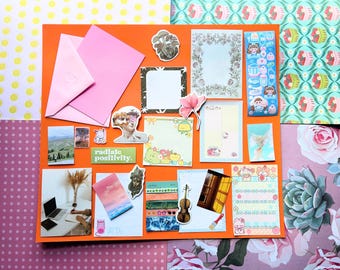 25 Piece Stationery Grab Bag, includes memo sheets, stickers, washi tape samples, ephemera