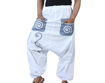 May include: White cotton pants with a loose, baggy fit and a drawstring waist. The pants have two large pockets on the front, each with a gray swirl design.