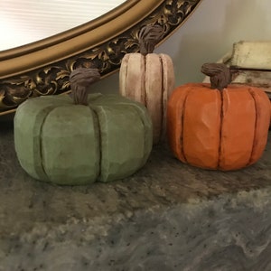 pumpkin trio hand-carved