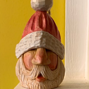 Santa head hand-carved with ball topper