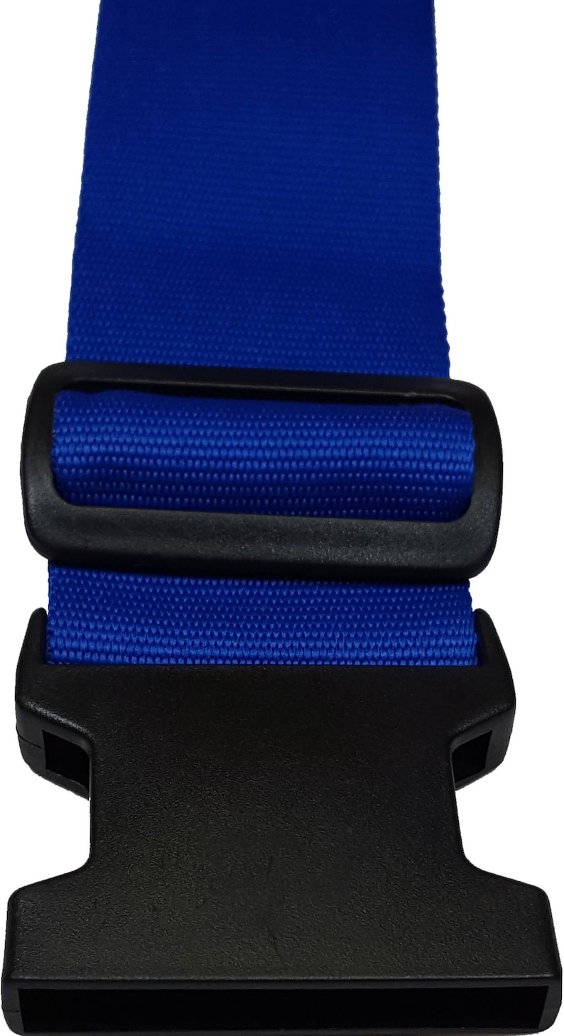 The image features a blue-coloured strap with a black plastic buckle, typically used for securing items like luggage.