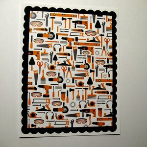 May include: A greeting card with a white background and a black scalloped border. The card's interior features a repeating pattern of orange, gray, and black tools, including hammers, saws, and drills. The design is suitable for a handyman or construction theme.