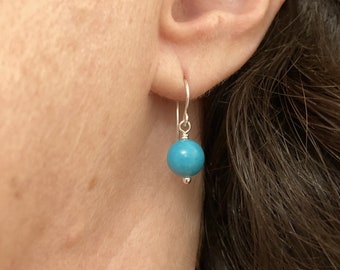 Turquoise and sterling silver earrings. December birthstone. Bluey-green turquoise beads on hand crafted silver earwires. Everyday earrings.